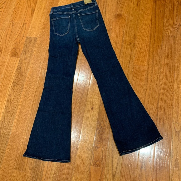 American Eagle Next Level Stretch Asymmetrical Super High Rise Flares - Picture 6 of 9